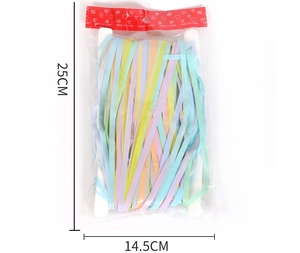 Macro detail of macaron fringe curtain packaging for birthday party wall decor background
