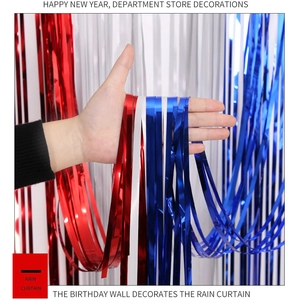 Detail of red white and blue metallic tinsel foil fringe curtains for party backdrops