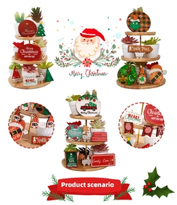 Detail of Christmas tiered wooden tray with North Pole signs and mini greenery decor