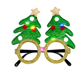 Christmas LED glowing glasses with sparkling green trees and red pom-poms for party decor