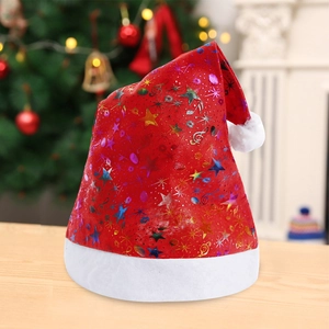 Festive red Christmas hat with laser star patterns and soft white plush trim for holiday parties