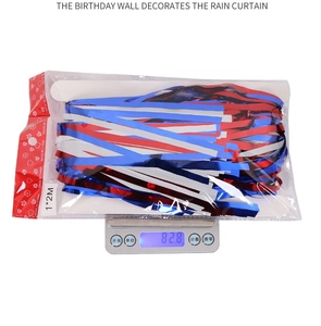Weight measurement of red, white, and blue foil fringe curtains for party decoration