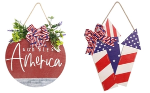 Detail of God Bless America wooden plaque and star-spangled rocket patriotic ornaments