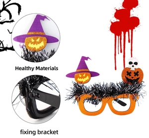 Detail of Halloween pumpkin glasses showing glitter frames and spooky wizard hat accents