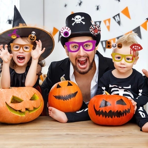 Halloween party glasses and props featuring glitter pumpkin, witch hat and ghost designs