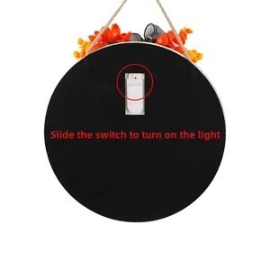 Detail of Halloween door sign back with LED battery box and manual power switch