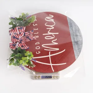 Detail view of American Independence Day round wood sign on scale weighing 159.5 grams