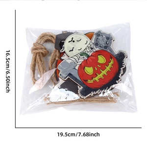 Detailed view of Halloween wooden pendant set with pumpkin and bat motifs in packaging