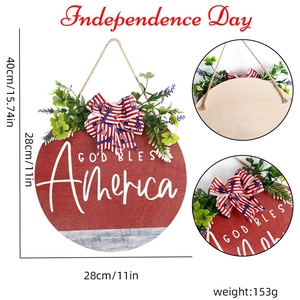 Independence Day round wooden door sign with God Bless America text and floral bow decoration