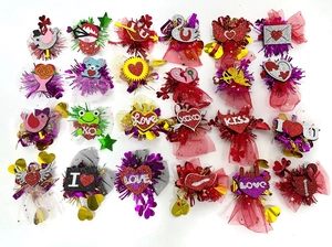 Detailed grid view of 24 assorted Valentine heart hair clips with glitter felt and sequins