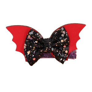 Halloween bat bow hair clip with red leather wings and black sequin glitter details