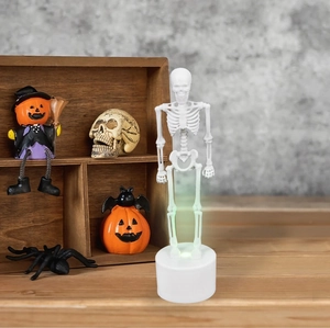 Halloween glowing skeleton figurine with white LED base for spooky indoor desk decoration