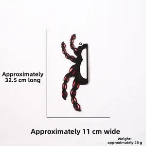 Détail de la décoration d'araignée suspendue rouge et noire avec dimensions 32,5x11cm
