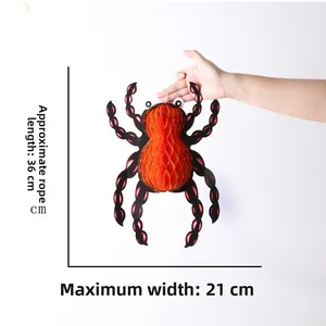 Halloween orange honeycomb paper spider hanging decoration with black paper legs