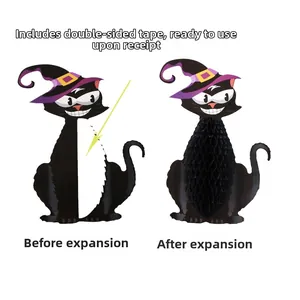 Detail showing Halloween black cat honeycomb paper ornament before and after unfolding