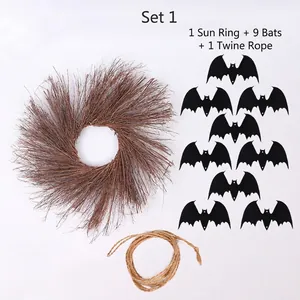 Détail du kit Halloween avec couronne tressée, neuf chauves-souris noires et corde de jute