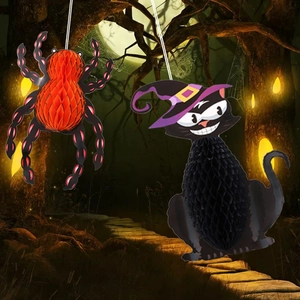 Detail of Halloween honeycomb paper spider and black cat hanging party decorations