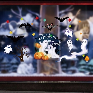 Halloween window decals featuring ghosts, bats, pumpkins and Trick or Treat text on glass