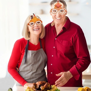 Funny Thanksgiving paper glasses set featuring pumpkin and turkey designs for party