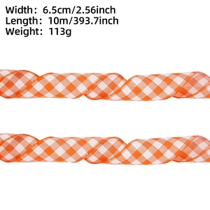 Detail showing 6.5cm wide orange and white gingham ribbon dimensions for gift wrapping