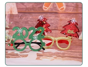 Detail von Weihnachtsbrillen mit Glitzer, 2022 und Merry Christmas Baum-Motiven