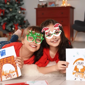 Kids Christmas paper glasses set with Santa and Snowman designs for holiday party fun