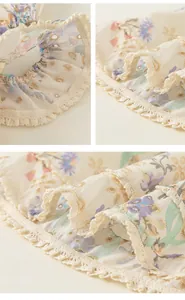 Gros plan sur le tissu à fleurs avec broderie ajourée et finitions en dentelle