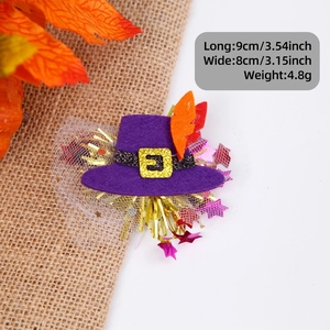 Detail view of purple witch hat hair clip with glitter gold buckle and festive sequins