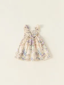 Robe bébé fille fleurie style français avec col à volants et détails d'ourlet ajouré