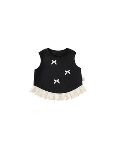 Top senza maniche nero da bambina con fiocchi bianchi e bordo in pizzo decorativo