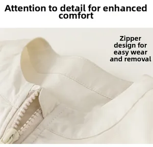 Detail of baby boy sleeveless utility jumpsuit showing neckline and high-quality zipper
