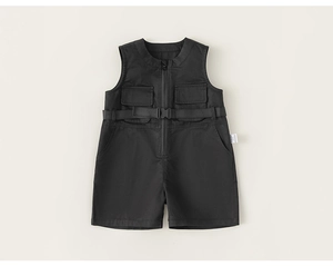 Detail of boys black cargo sleeveless romper with zipper and adjustable buckled waist belt