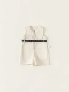 Cream sleeveless utility romper for toddler boys with front zipper and black buckle belt