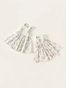 Sweet floral sleeveless cotton dresses for girls with lace trim and bow details