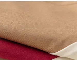 Close-up of soft cotton knit fabric in khaki, red and white for children's t-shirts
