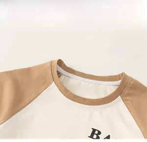 Detailed view of kids crew neck with Cute B print and contrasting raglan sleeves