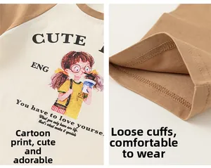 Detail of cartoon girl print and loose sleeve cuffs on cotton raglan T-shirt