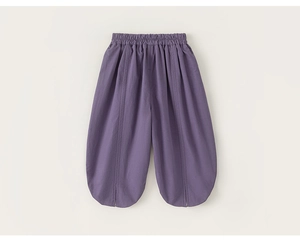 Detail showing high-waisted elastic band and purple linen wide-leg pants fabric texture
