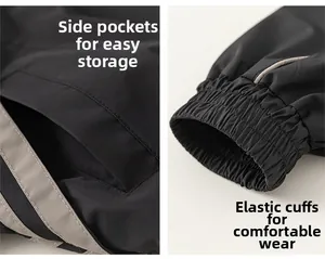 Detail shot of black boys jacket featuring side pockets and elastic ribbed cuffs