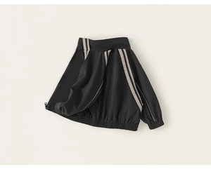 Detail of children's black athletic jacket featuring gray stripes and stand collar