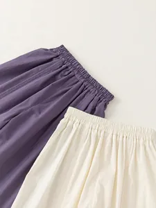 Girls lightweight wide-leg trousers in purple and beige with elastic waist and side slits