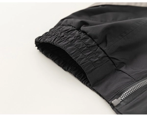Detail view of boys sportswear jacket with elastic cuffs and high-quality metal zipper