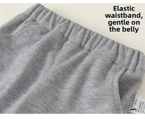 Detailed macro view of the grey cotton knit elastic waistband for girls trousers