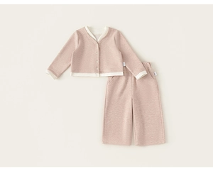Detail of soft knit cotton girls cardigan and wide-leg pants in dusty pink color
