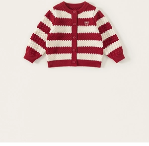 Detail of red and white striped knit cardigan with heart embroidery and red buttons
