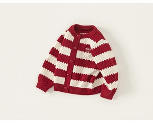 Detail of red and white striped knit cardigan with textured pineapple stitch and heart embroidery