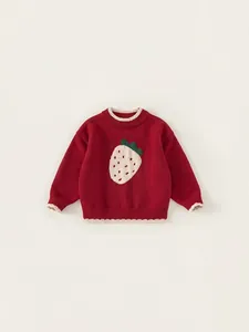 Kids red knit sweater with strawberry jacquard pattern and contrast ribbed trim