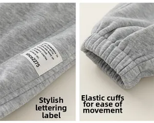 Détails du jogging gris pour fille avec étiquette tissée et chevilles élastiques côtelées