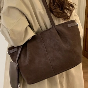 Large chocolate brown suede tote bag for women with decorative straps and small pouch