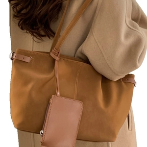 Caramel brown suede tote bag with large capacity and matching small coin purse detail